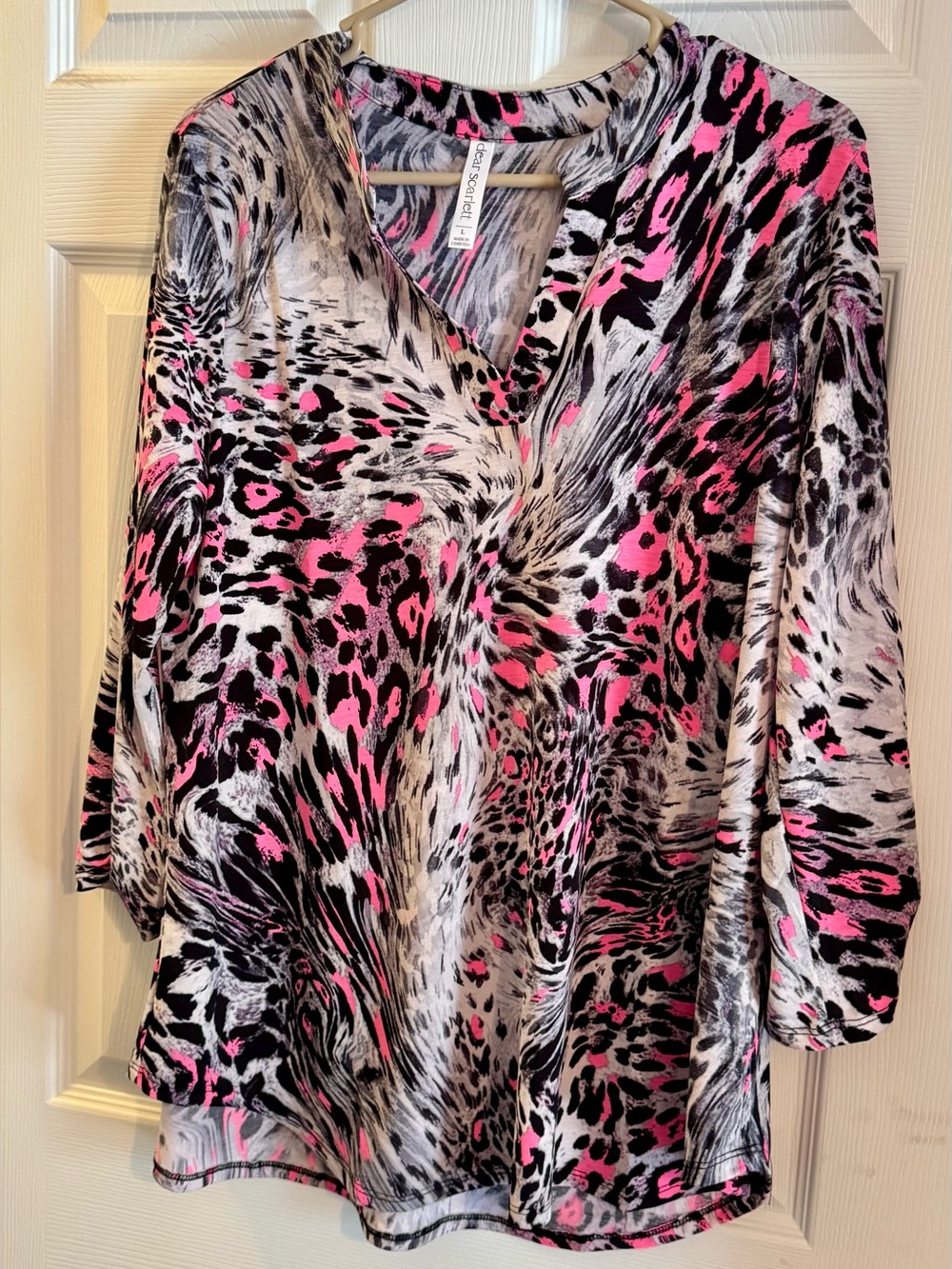 Women's V-Neck Animal Print Top in Black and Pink